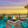 Beautiful views of the lake and surrounding Vida Lakewood Ranch's apartment buildings from the community firepit